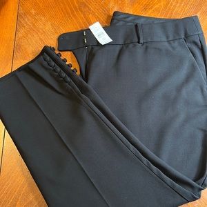 Black pants with button detail on the cuff. Loft brand, “Marisa” size 22.